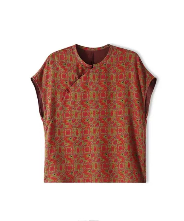 Top cheongsam in seta smeraldo con motivi geometrici